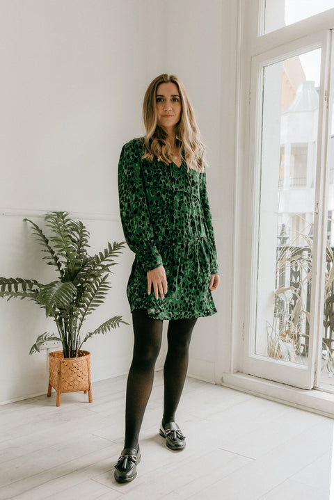 Emily wears a size 8 and is 5’3’. Mini length 84cm.